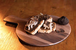 Toasted bread with truffle cream and Colonnata Lard